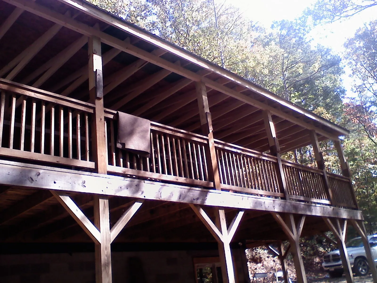 Timber framing under a new elevated porch and deck — Roof Leak Repair in Mitchell by Roofing Brothers